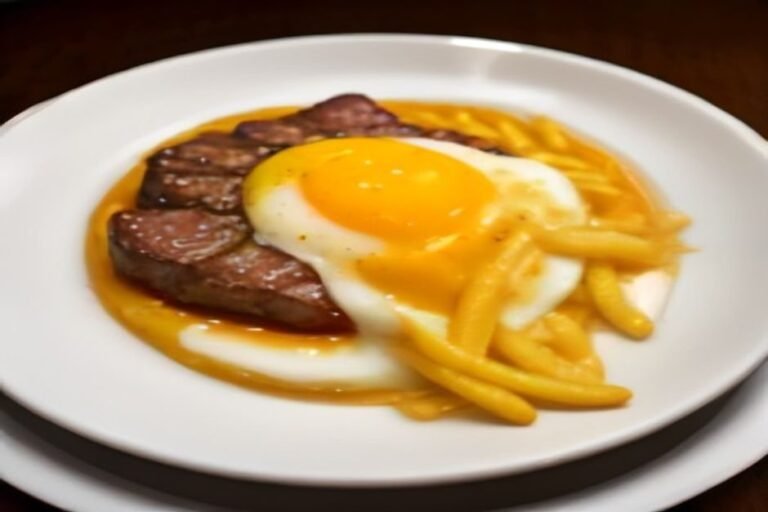 Bife a cavalo com batatas fritas